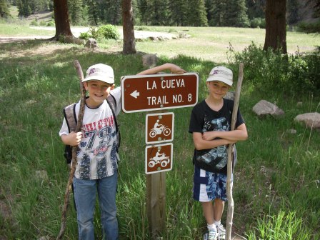 Sam and Caleb at Trailhead Sign